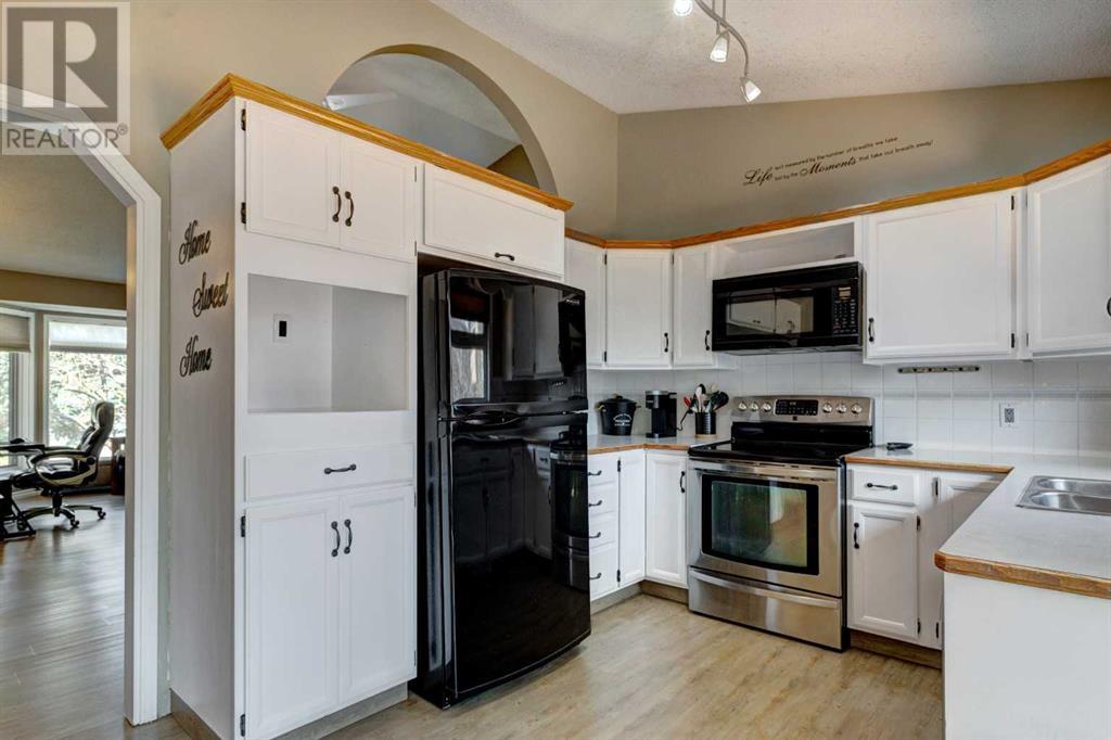 Single Family House 4 Level for Sale in  Macewan Ridge Close NW MacEwan Glen Calgary 