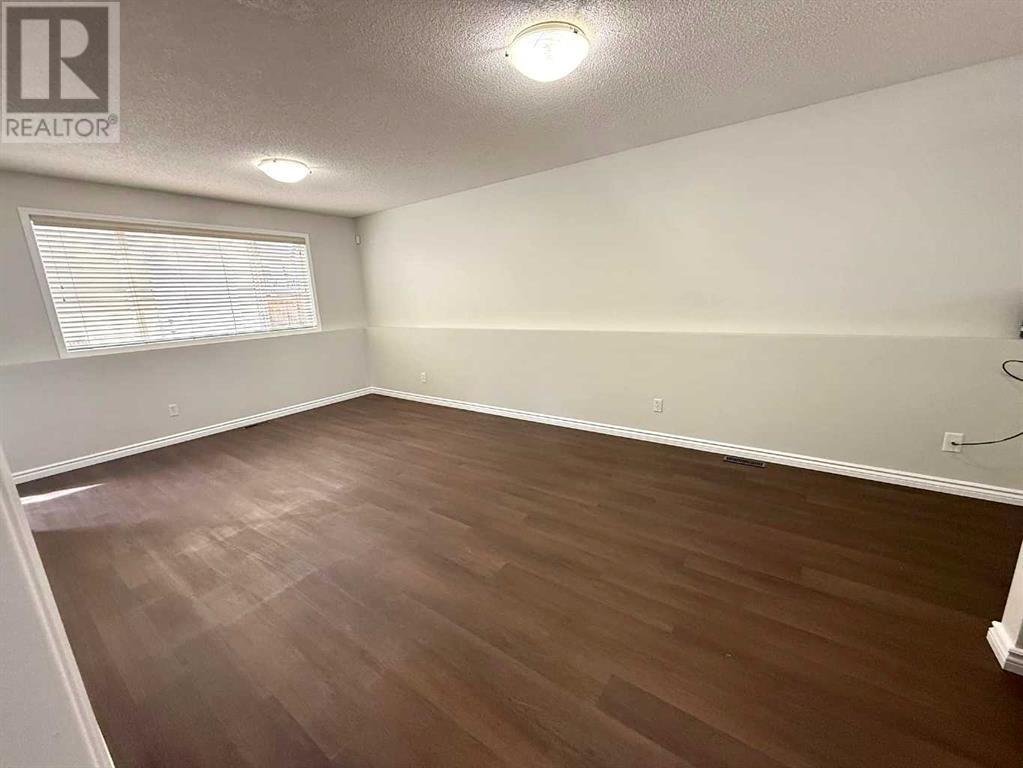 Single Family House 4 Level for Sale in  Evermeadow Road SW Evergreen Calgary 