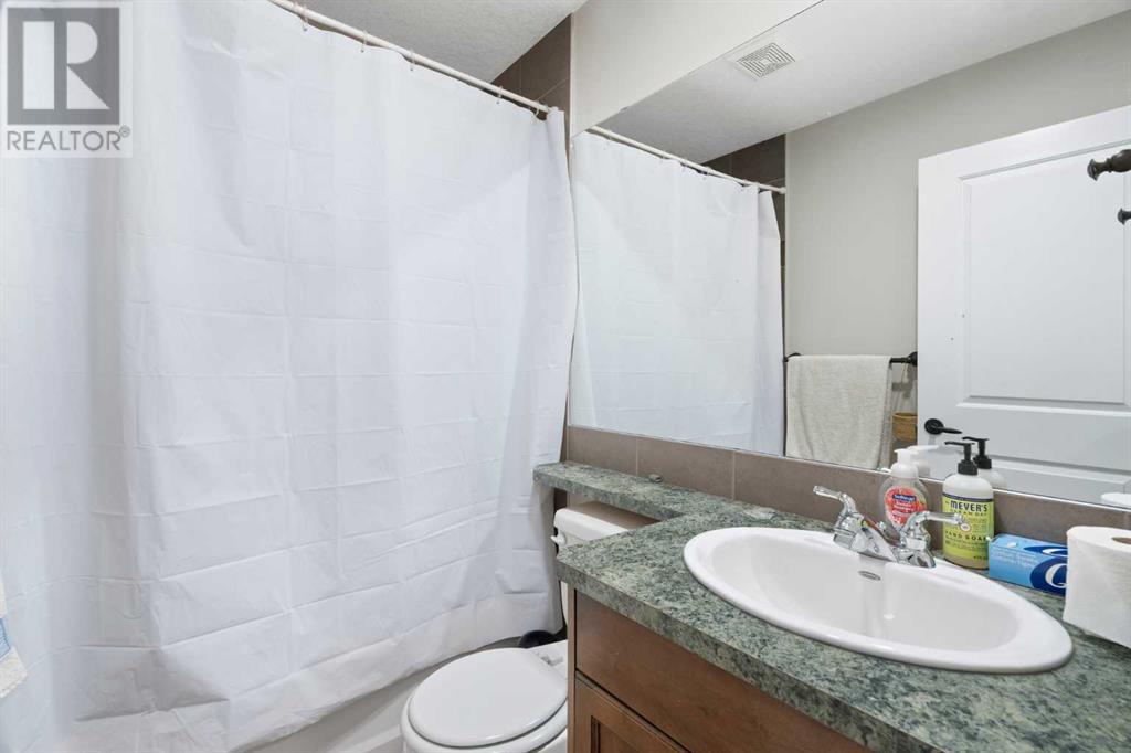 Single Family House for Sale in  Ypres Green SW Garrison Woods Calgary 