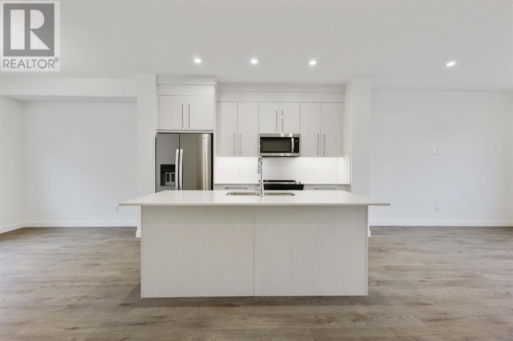 Single Family House for Sale in  Belmont Passage SW Belmont Calgary 
