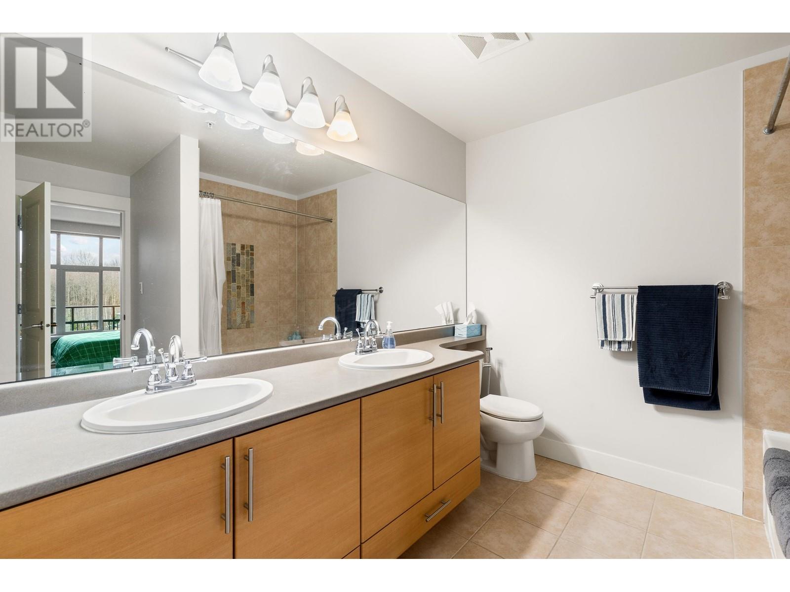 407 1211 VILLAGE GREEN WAY, Squamish real estate listing R2993730