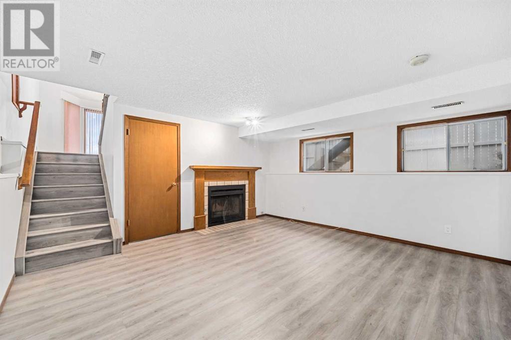 Single Family House 4 Level for Sale in  Sandstone Drive NW Sandstone Valley Calgary 