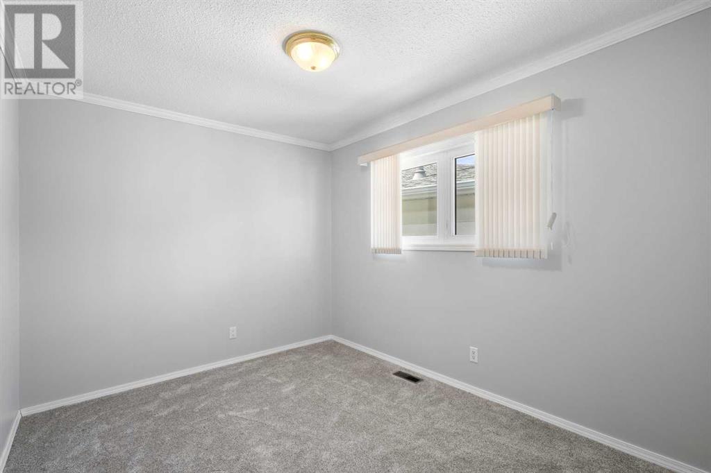 7419 Huntertown Crescent NW Photo 22 - Calgary Real Estate
