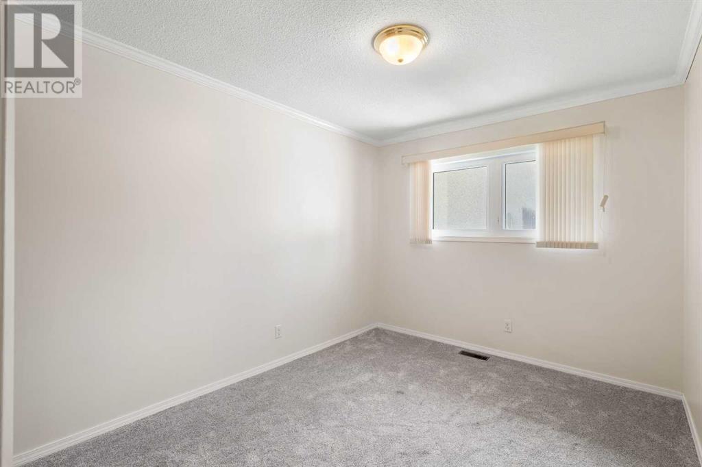 7419 Huntertown Crescent NW Photo 19 - Calgary Real Estate
