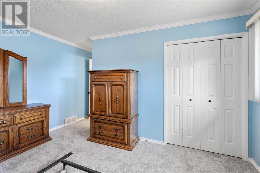 7419 Huntertown Crescent NW Photo 17 - Calgary Real Estate