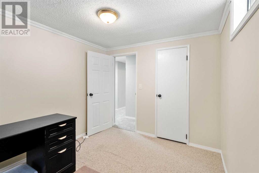 7419 Huntertown Crescent NW Photo 29 - Calgary Real Estate