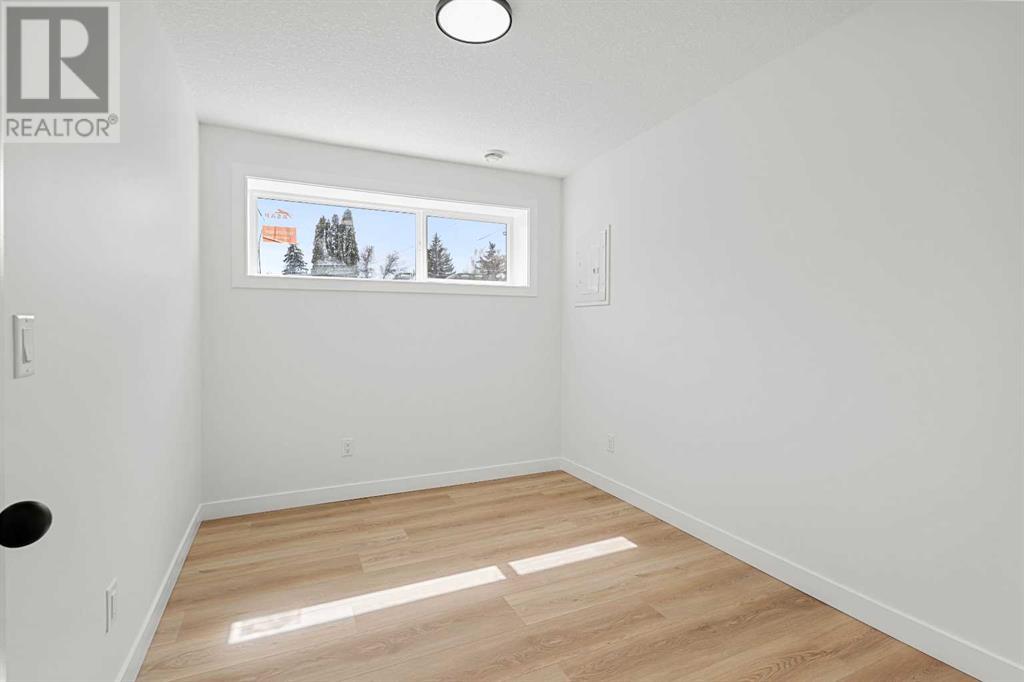 Single Family House Bi-level for Sale in   Avenue SW Kingsland Calgary 