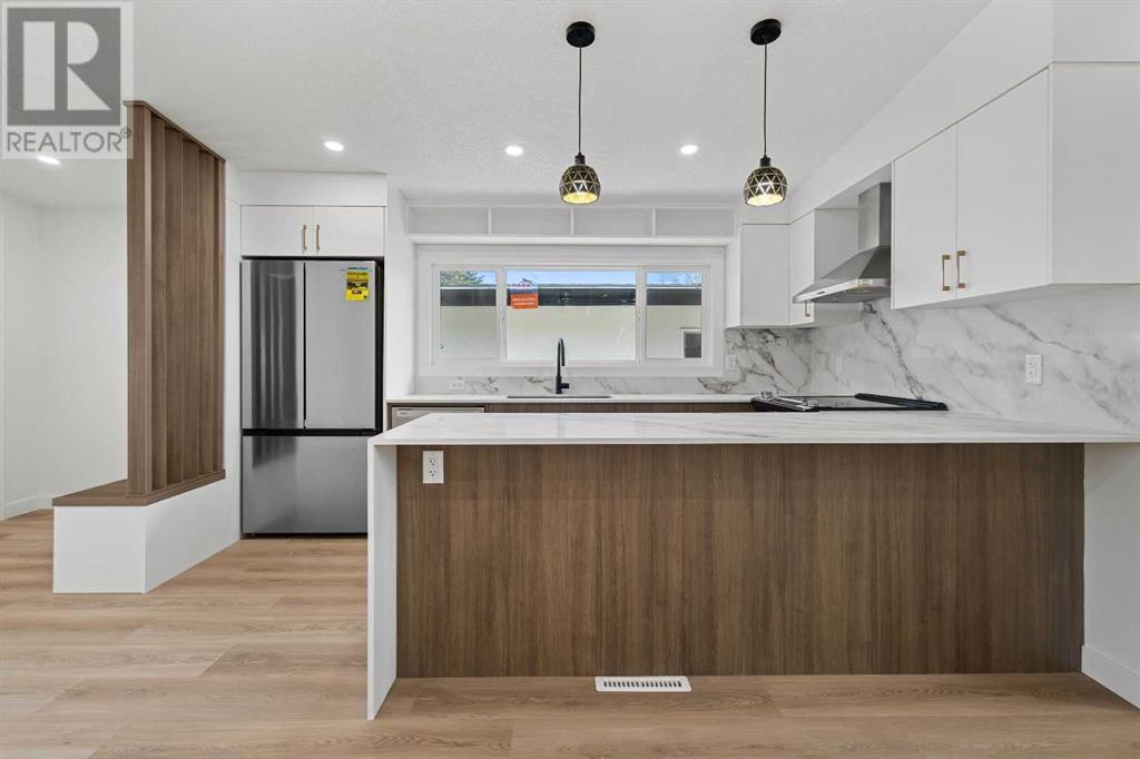 Single Family House Bi-level for Sale in   Avenue SW Kingsland Calgary 