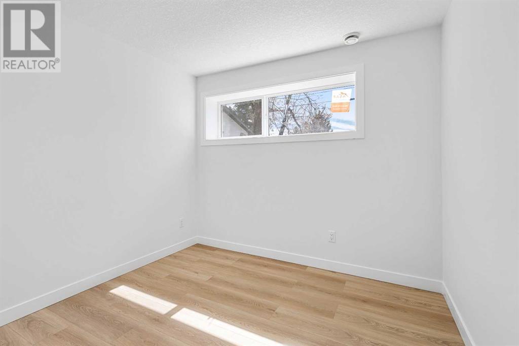 Single Family House Bi-level for Sale in   Avenue SW Kingsland Calgary 