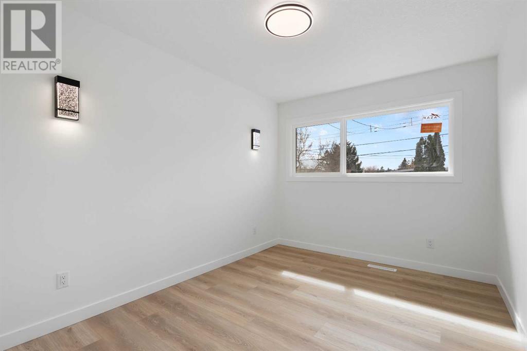 Single Family House Bi-level for Sale in   Avenue SW Kingsland Calgary 