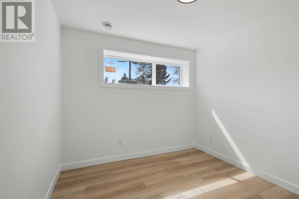 Single Family House Bi-level for Sale in   Avenue SW Kingsland Calgary 