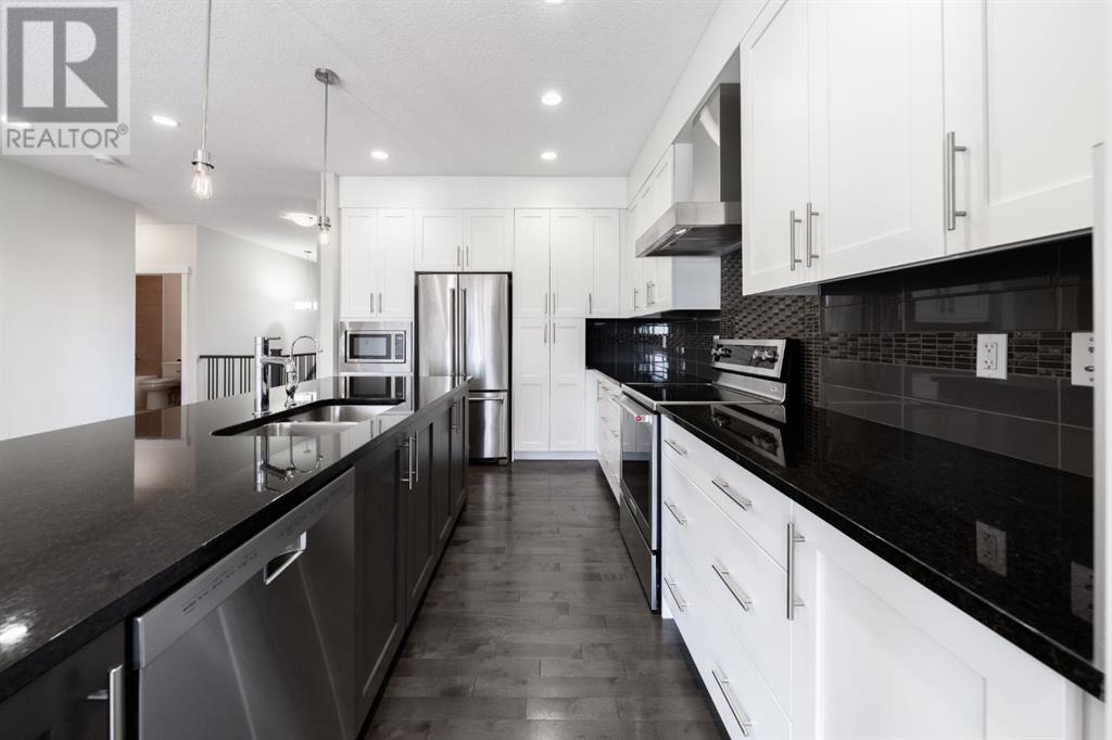 Single Family House Bungalow for Sale in  Sierra Morena Manor SW Signal Hill Calgary 