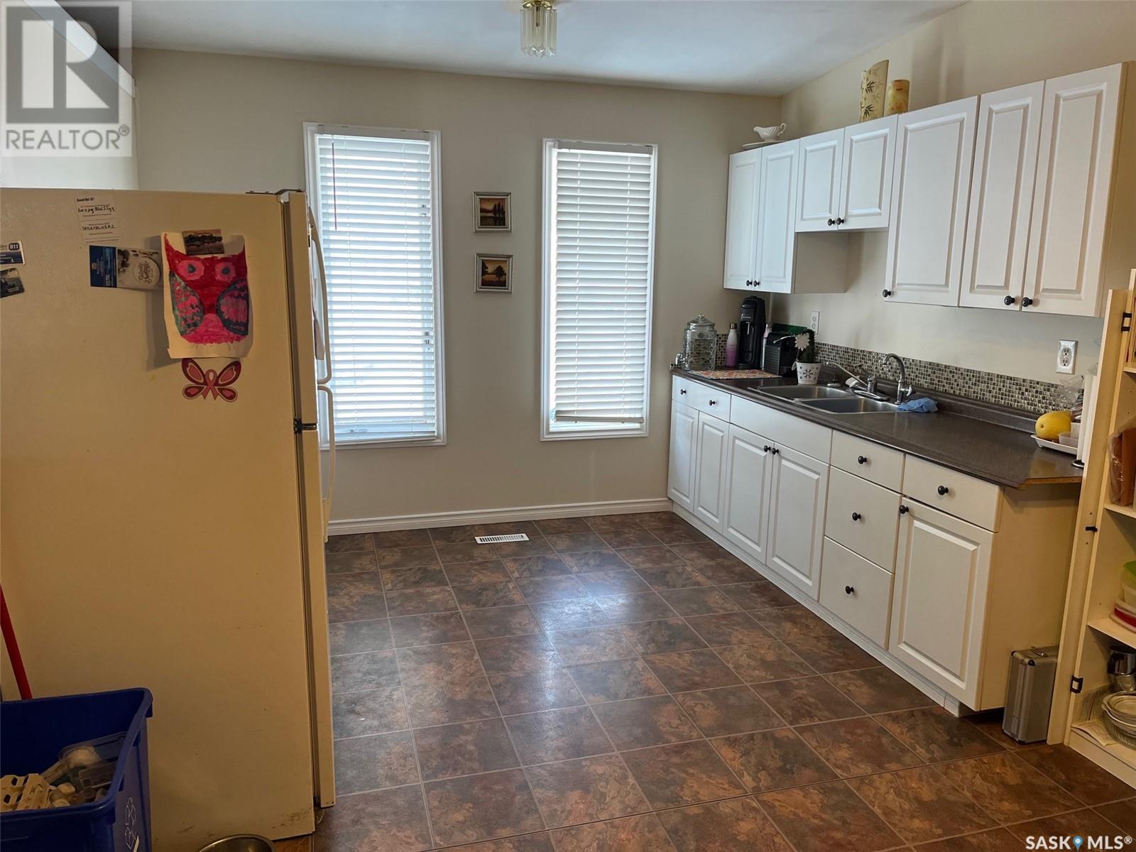 Photo 20 of 738 Bard Crescent N, Regina SK