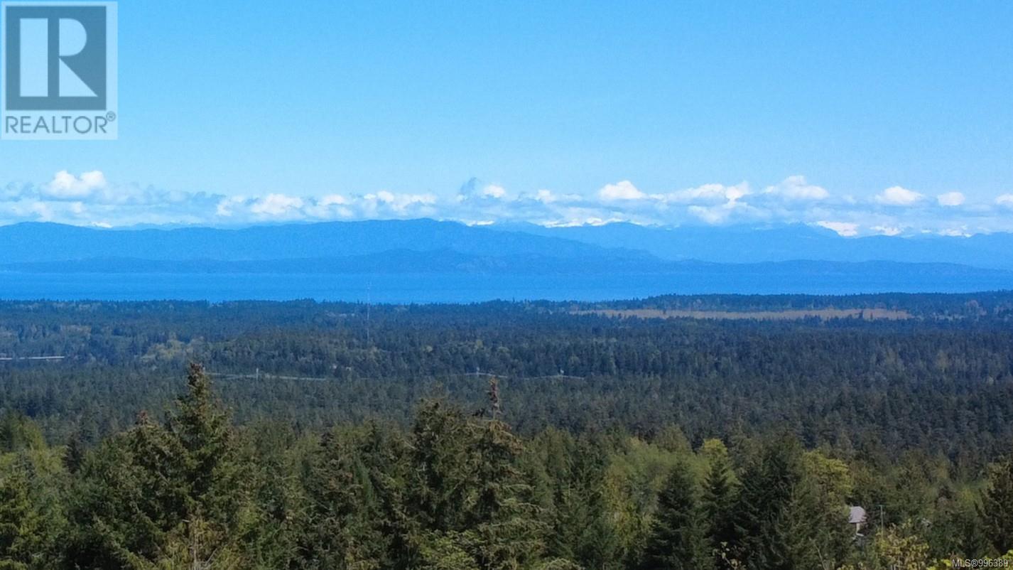 Photo 5 of 1725 Warn Way, Qualicum Beach BC