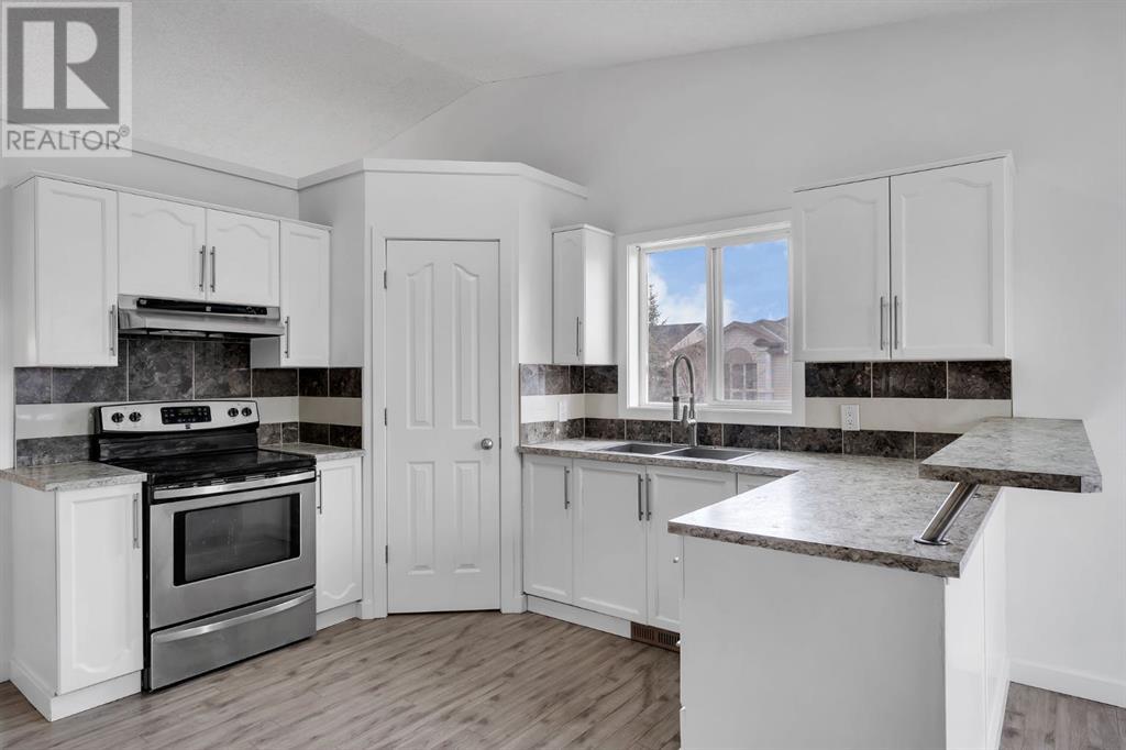 Single Family House Bi-level for Sale in  Coverdale Court NE Coventry Hills Calgary 
