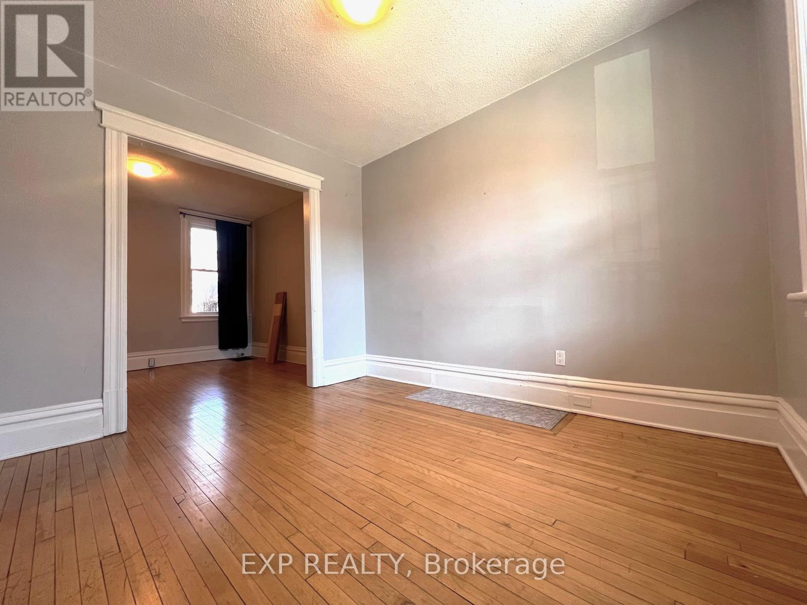 Living room adjacent to dining area