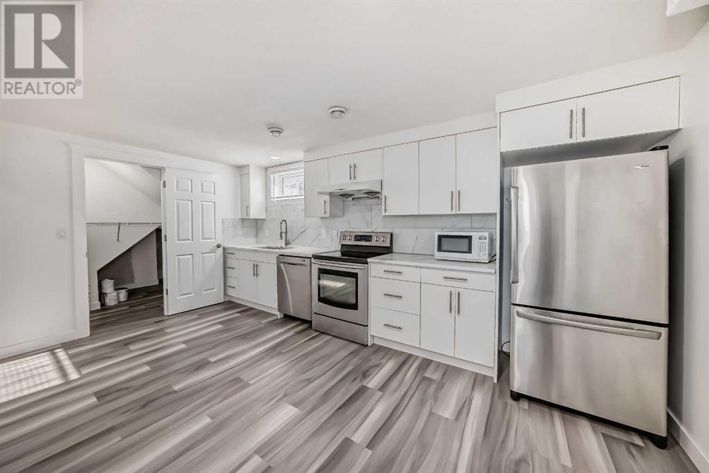 Single Family House Bi-level for Sale in  Beaver Dam Way NE Thorncliffe Calgary 