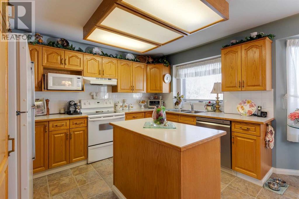 Single Family House Bungalow for Sale in  Sierra Morena Terrace SW Signal Hill Calgary 