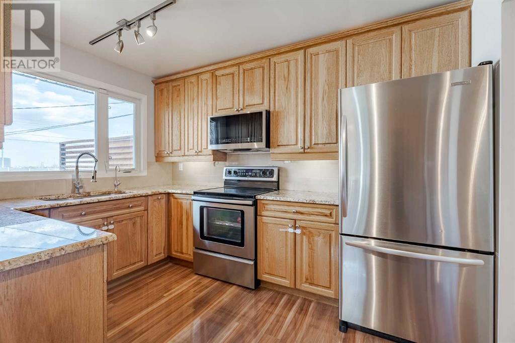 Single Family House Bi-level for Sale in  Addison Drive SE Acadia Calgary 