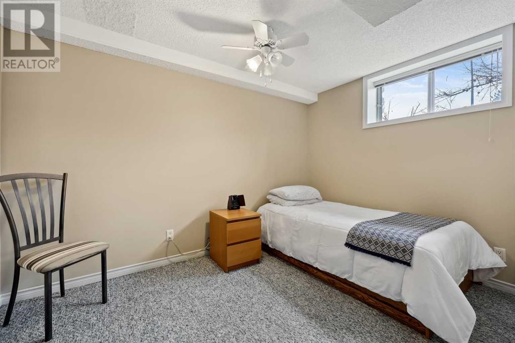 Single Family House 5 Level for Sale in  Hawkfield Crescent NW Hawkwood Calgary 