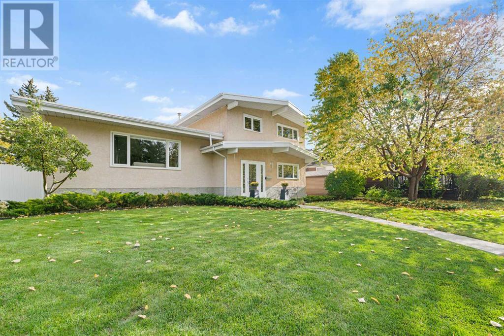 Single Family House 3 Level for Sale in  Vandoos Place NW Varsity Calgary 