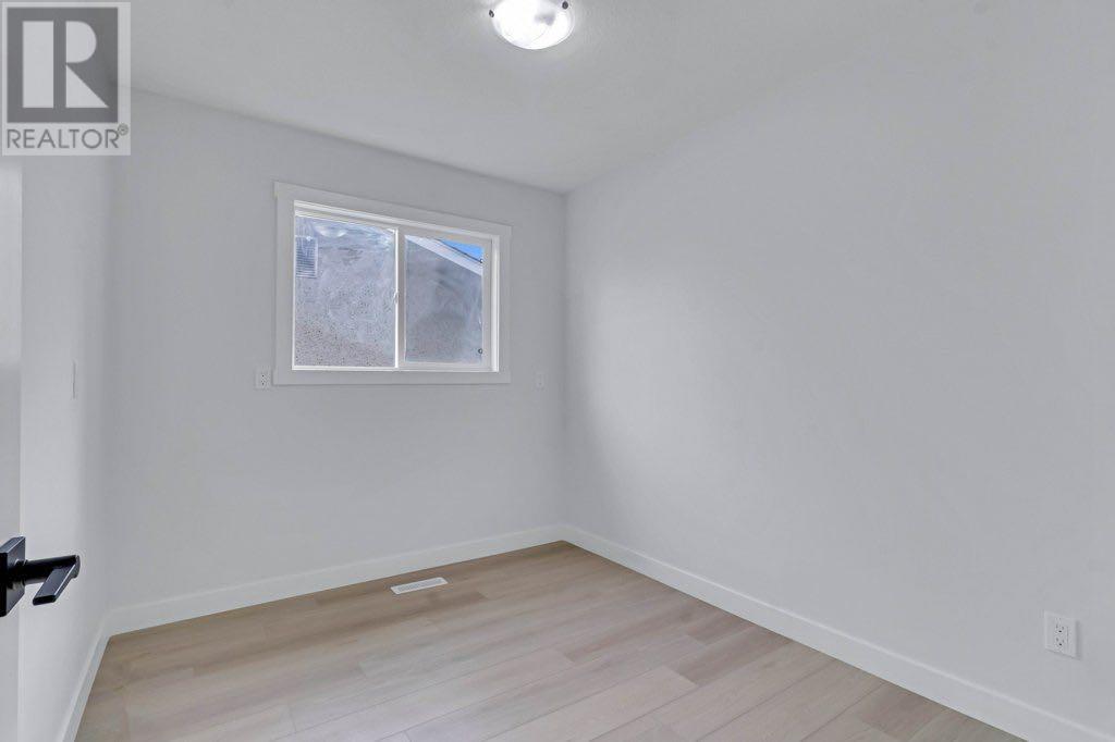 Single Family House Bi-level for Sale in  Penmeadows Close SE Penbrooke Meadows Calgary 