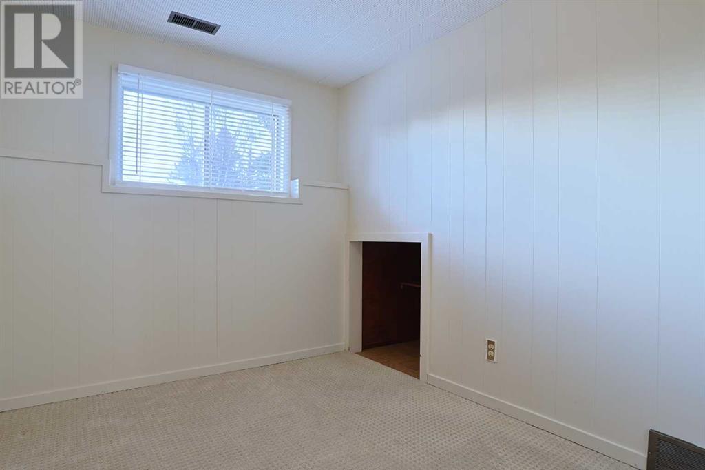 Single Family House Bi-level for Sale in  Vancouver Crescent NW Varsity Calgary 