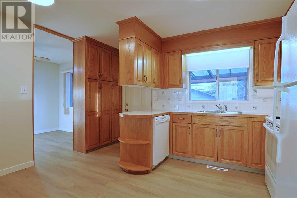 Single Family House Bi-level for Sale in  Vancouver Crescent NW Varsity Calgary 