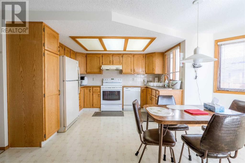 Single Family House for Sale in  Hawkland Circle NW Hawkwood Calgary 