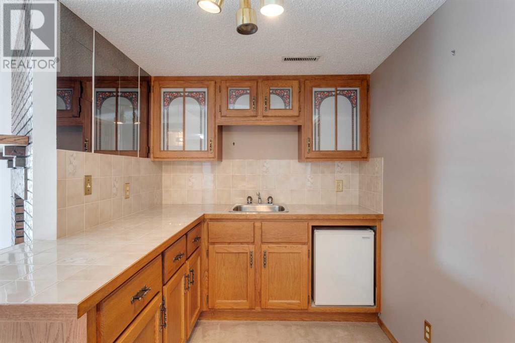 Single Family House for Sale in   Strathcona Road SW Strathcona Park Calgary 