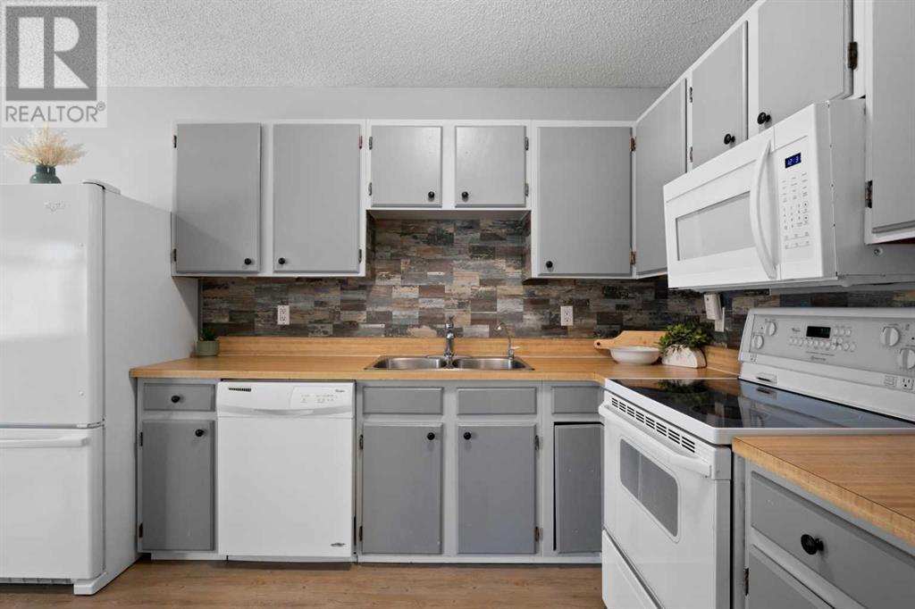 Single Family House Bungalow for Sale in   Deerfield Drive SE Deer Run Calgary 