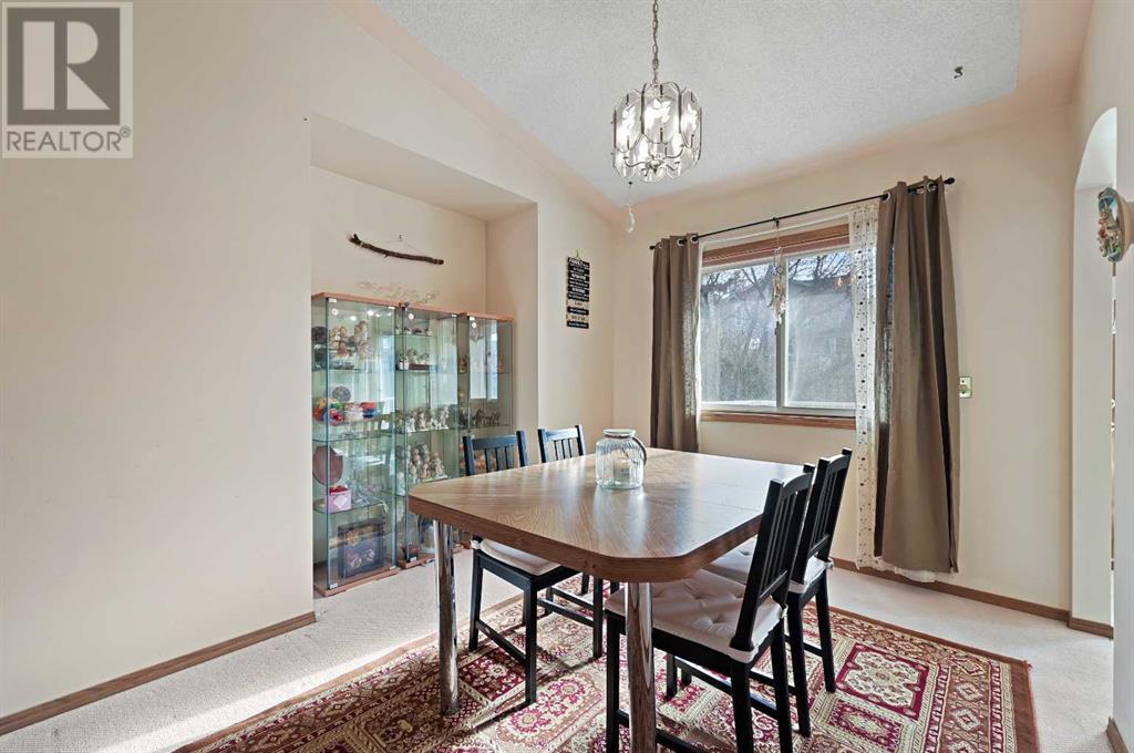 Single Family House Bi-level for Sale in  Hawkwood Drive NW Hawkwood Calgary 