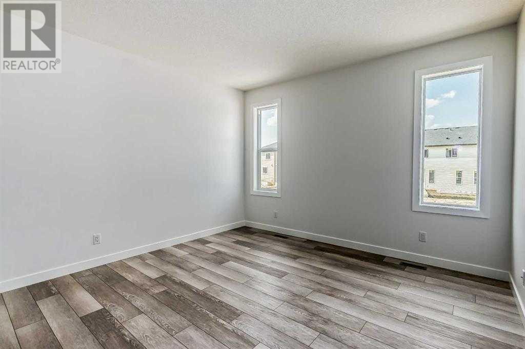 Single Family House for Sale in  Amblehurst Green NW Moraine Calgary 