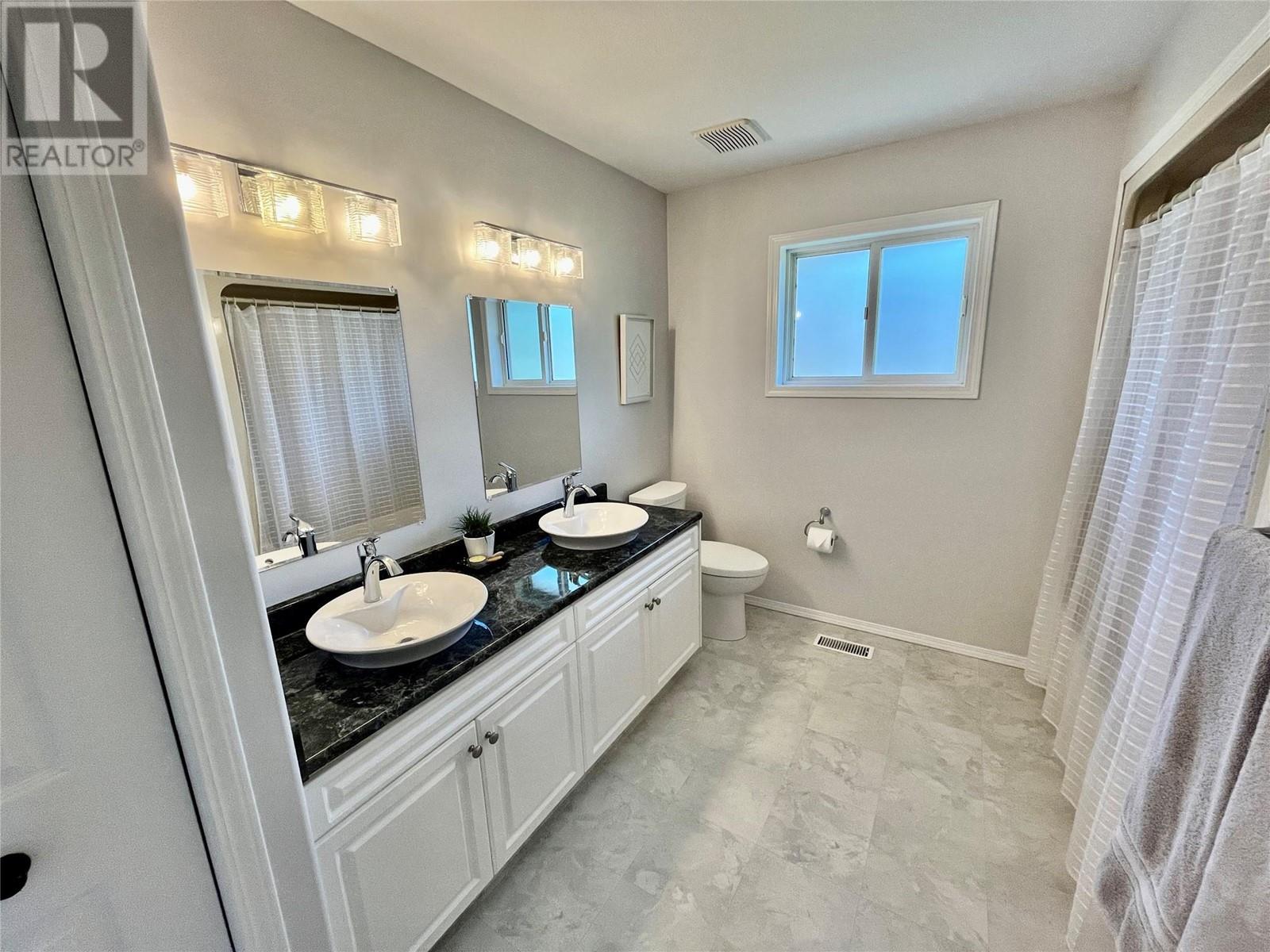 Photo 62 of 514 Forest Park Street, Sicamous BC