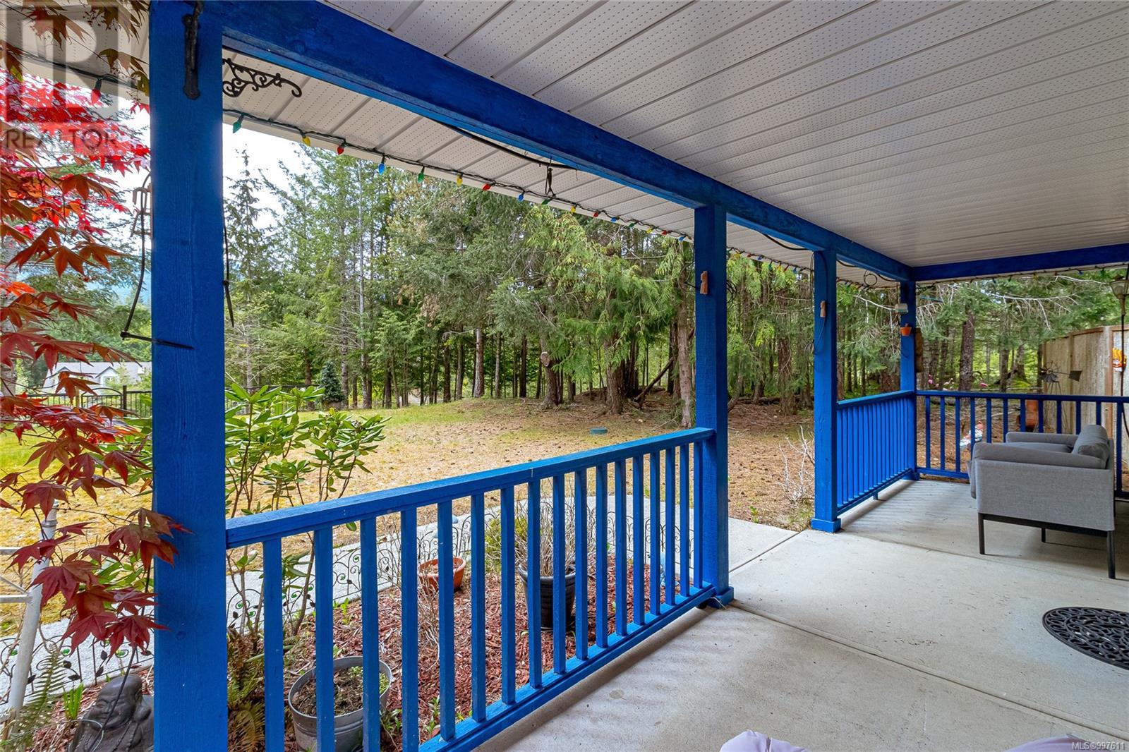 Photo 2 of 1335 Meadowood Way, Qualicum Beach BC