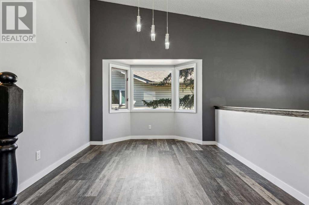 Single Family House 4 Level for Sale in  Hawkley Valley Road NW Hawkwood Calgary 