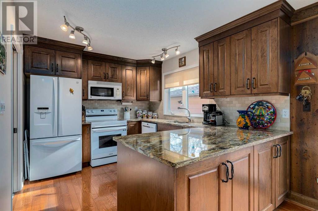 Single Family House Bungalow for Sale in  Midglen Road SE Midnapore Calgary 