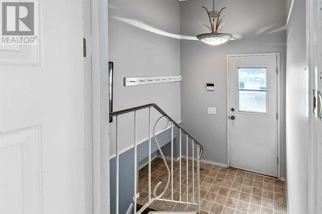 Single Family House Bungalow for Sale in  Woodpark Crescent SW Woodlands Calgary 