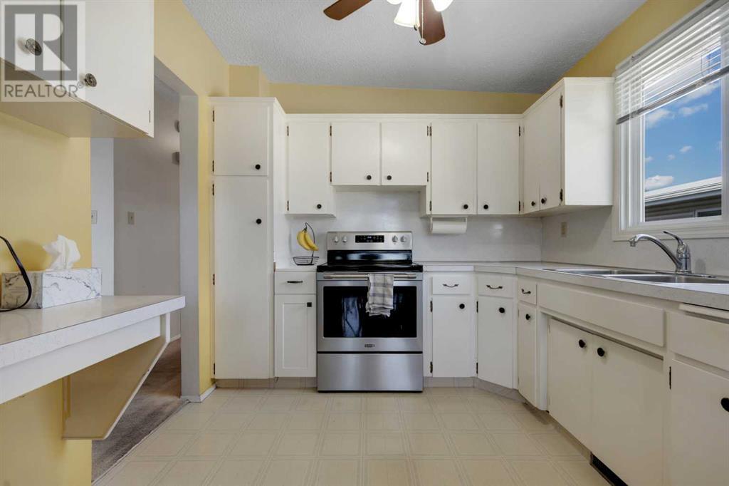 Single Family House Bi-level for Sale in  Canfield Road SW Canyon Meadows Calgary 