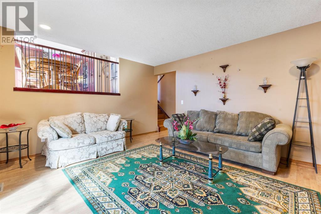 Single Family House 4 Level for Sale in  Hawkdale Close NW Hawkwood Calgary 