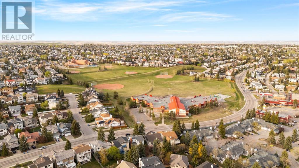 Single Family House 4 Level for Sale in  Hawkdale Close NW Hawkwood Calgary 