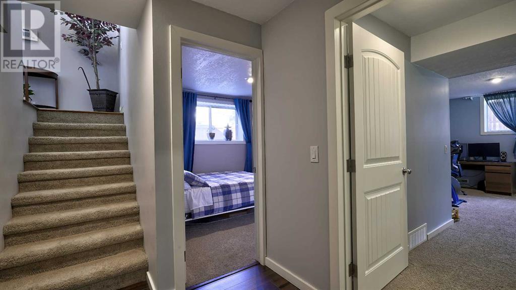 Single Family House Bi-level for Sale in  Ranchridge Road NW Ranchlands Calgary 