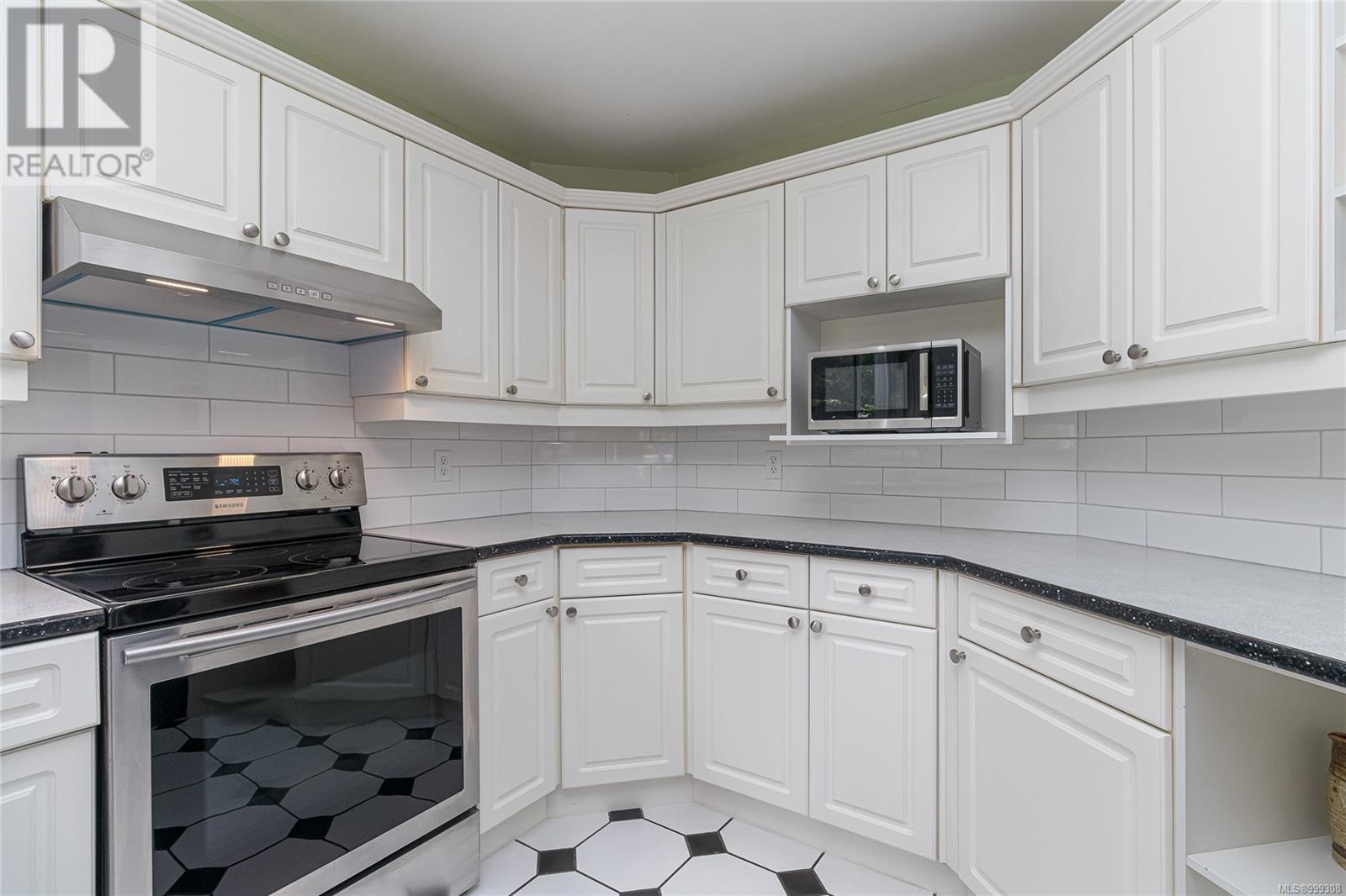 Photo 17 of 1211 Burnside Rd W, Saanich BC