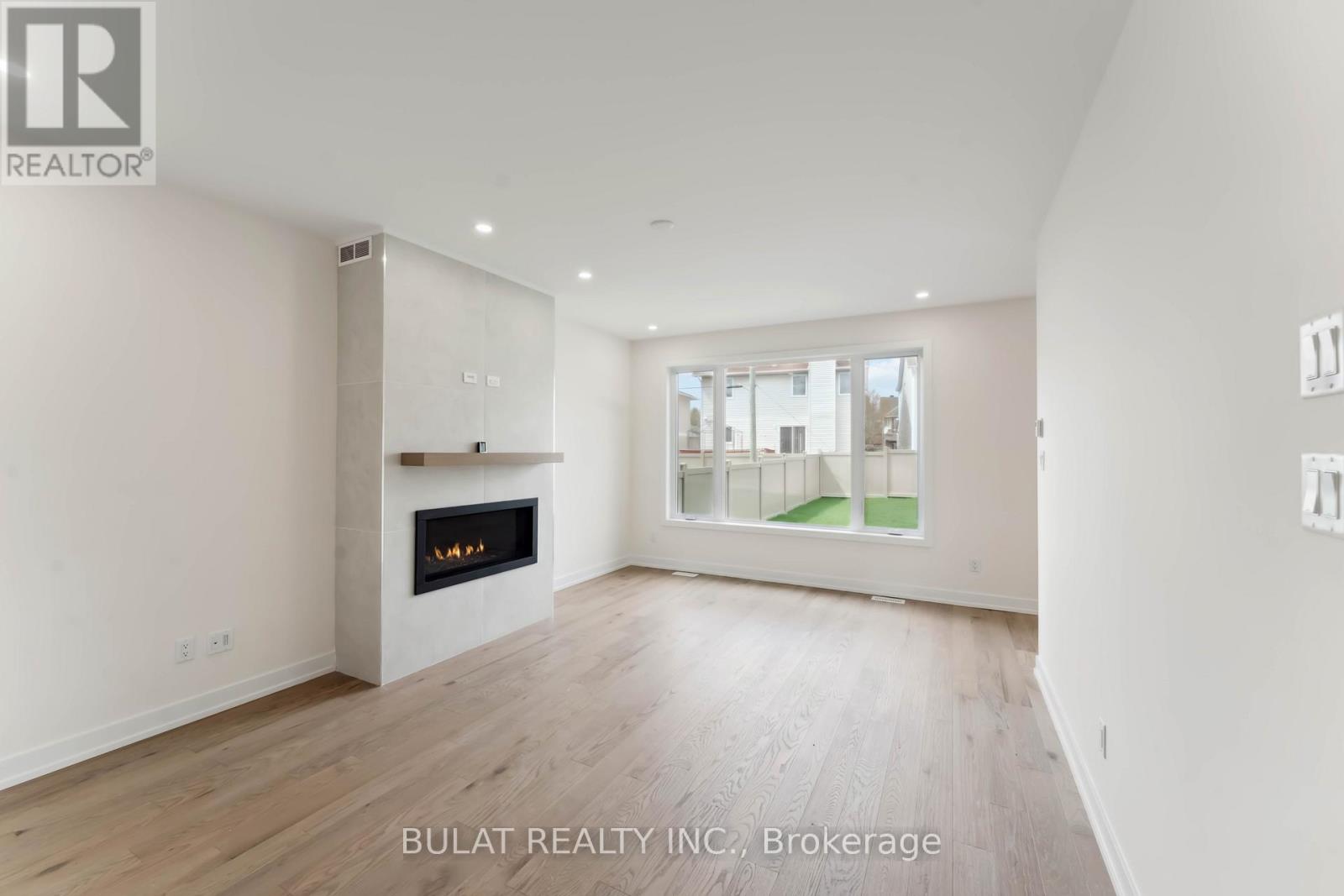 cosy up to the living rm fireplace- as is