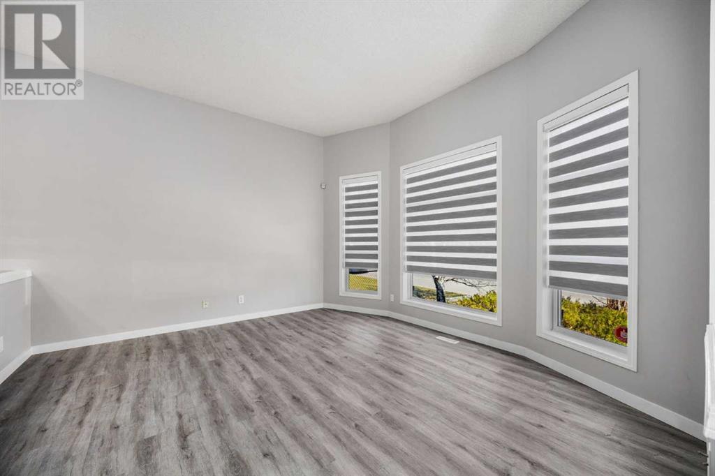 Single Family House 4 Level for Sale in  Everstone Road SW Evergreen Calgary 