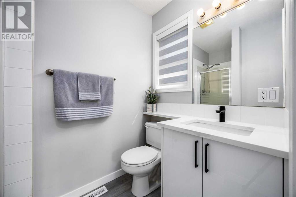 Single Family House 4 Level for Sale in  Everstone Road SW Evergreen Calgary 