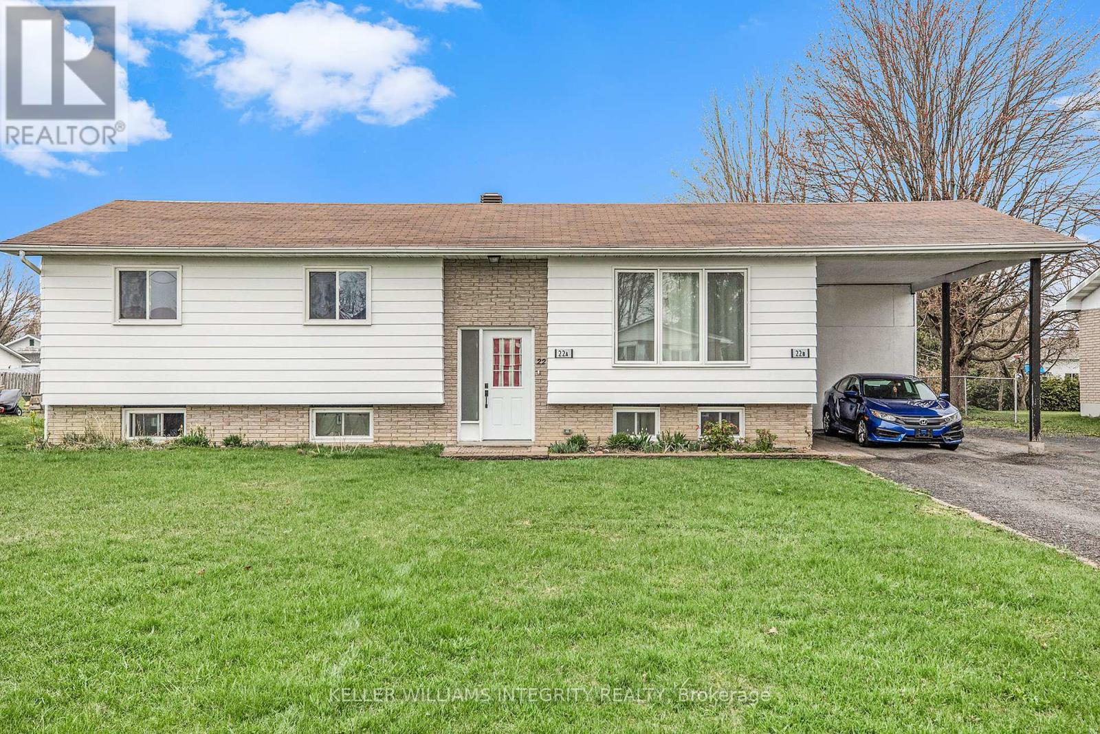 Exterior front. Separate entrance under carport.