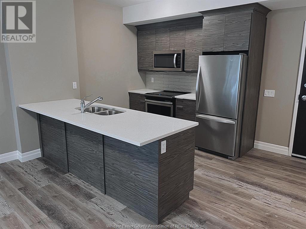 Photo 5 of 955 Ouellette Avenue Unit 102, Windsor ON