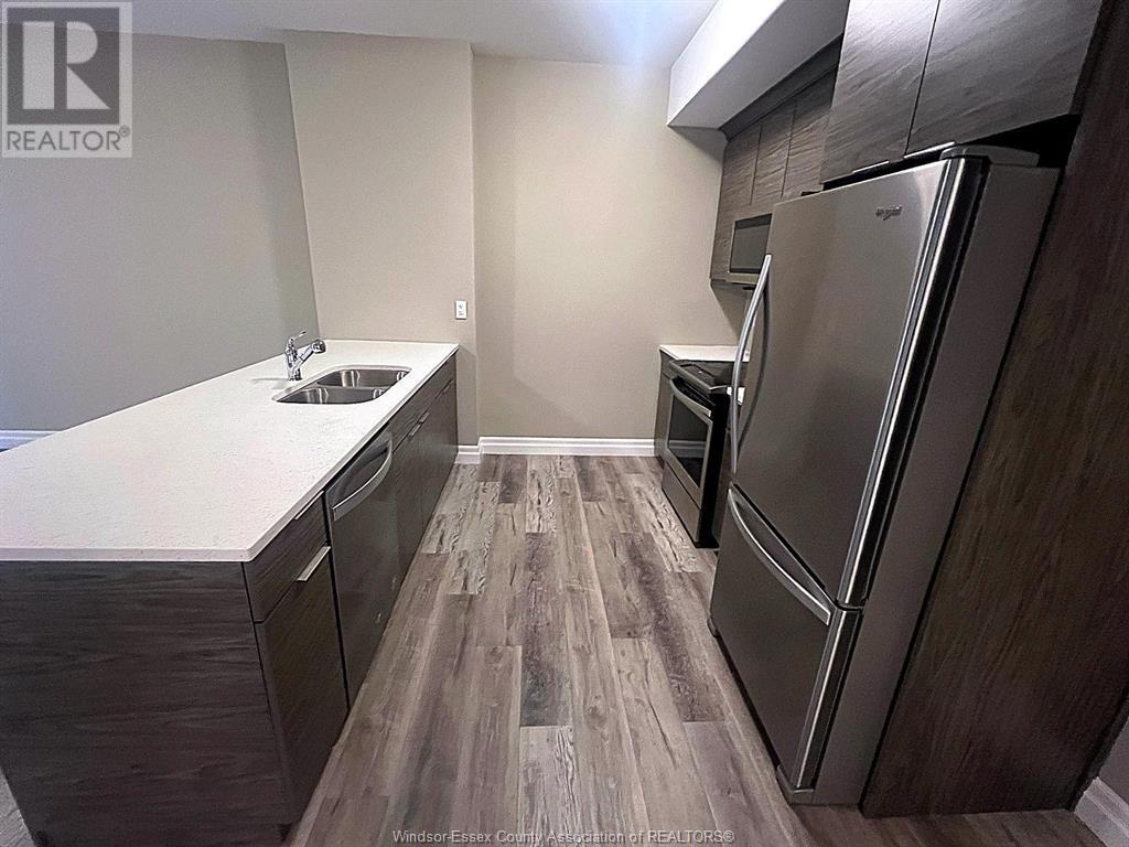 Photo 6 of 955 Ouellette Avenue Unit 102, Windsor ON
