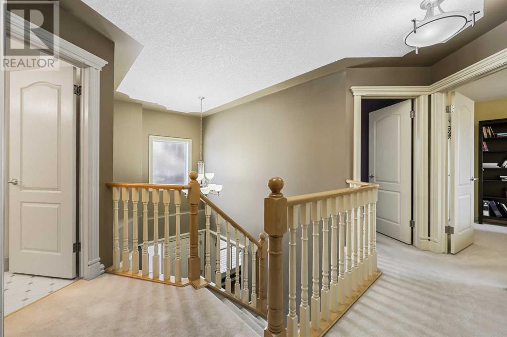 Single Family House for Sale in  Strathridge Crescent SW Strathcona Park Calgary 